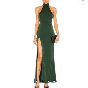 Beautiful dark green dress. Its new ! I wore it once for a event. Size is XS.